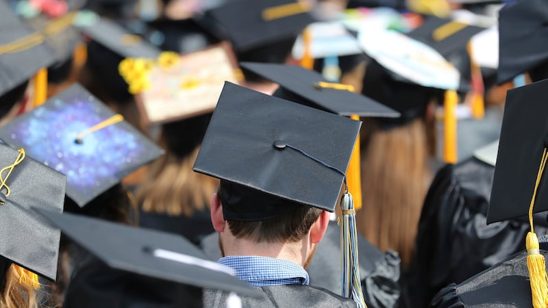 FILE - In this May 5, 2018, file photo, graduates at the University of Toledo commencement...