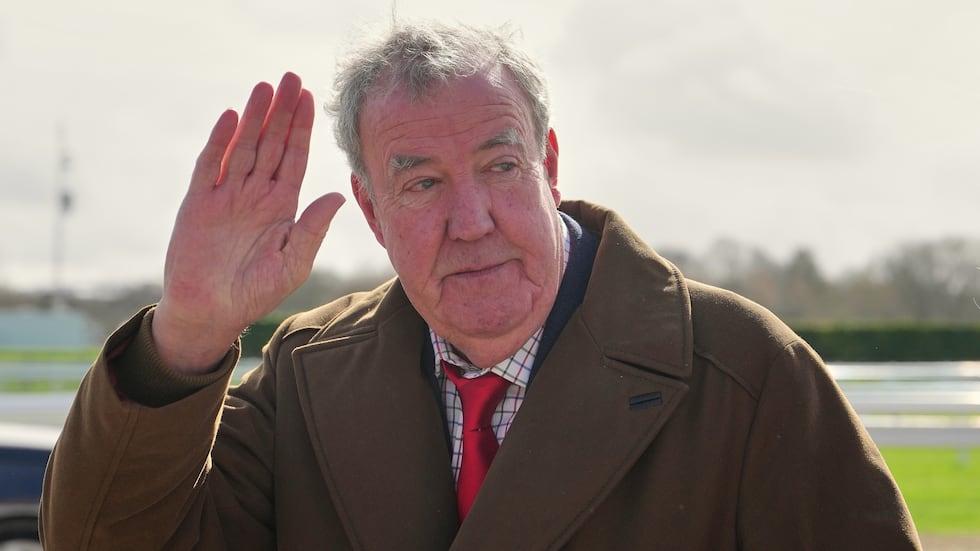 FILE - TV presenter Jeremy Clarkson waves to the media as he arrives on day four of the 2026...
